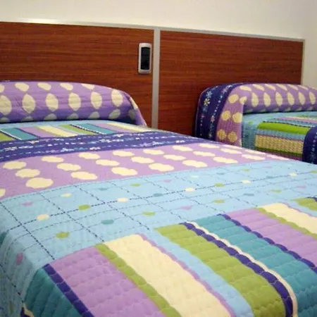 Apartment Gilmar Apartments: Beachfront Luxury With Pool And Parking In