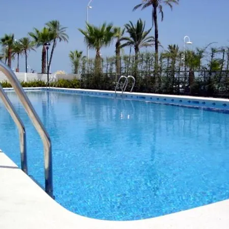 Apartment Gilmar Apartments: Beachfront Luxury With Pool And Parking In
